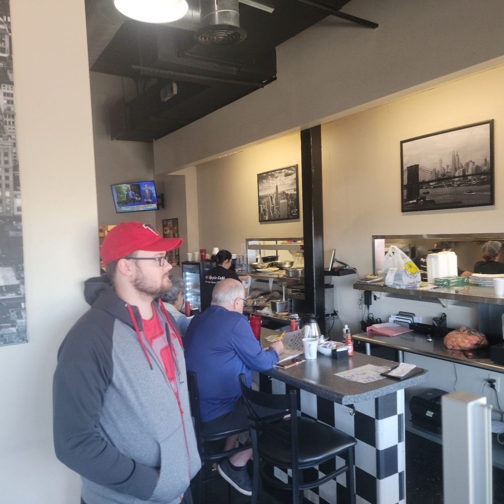 Big Apple Cafe - a man and a woman sitting at a table - American Near Me - Newark, Ohio