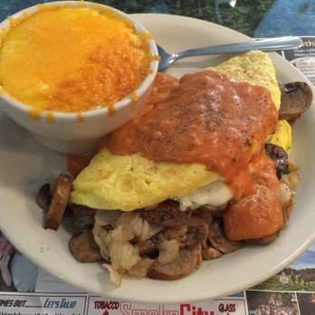 Metro Diner - One of my favorite food to get here: the Tuscan omelet!! Yummy!!! I also have a side of cheesy grits :) - Breakfast & Brunch Near Me - Jacksonville, Florida Metro Diner - One of my favorite food to get here: the Tuscan omelet!! Yummy!!! I also have a side of cheesy grits :) - Breakfast & Brunch Near Me - Jacksonville, Florida