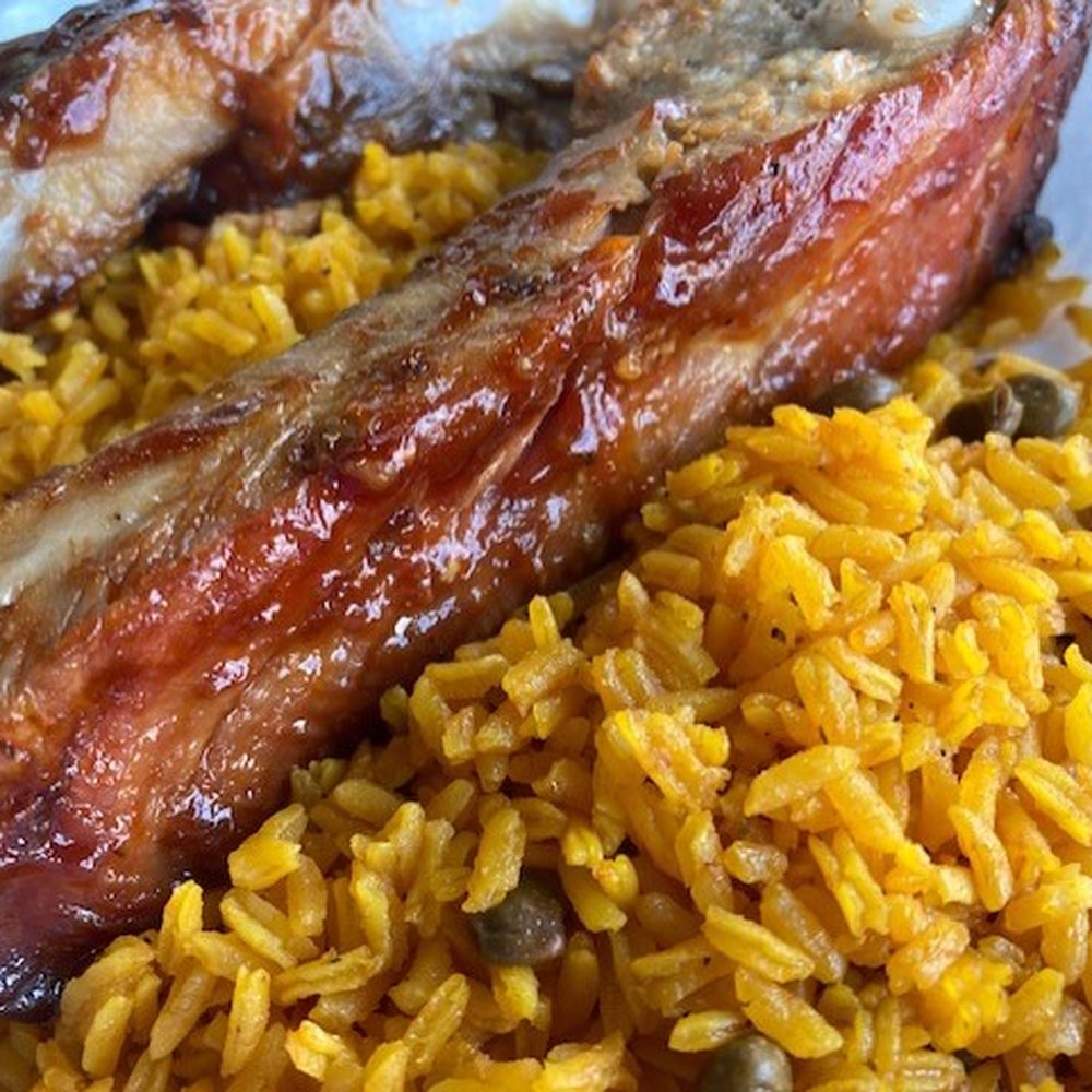 Lechonera Orlando - Barbeque Ribs with Rice and Pigeon Peas - Latin American Near Me - Orlando, Florida Lechonera Orlando - Barbeque Ribs with Rice and Pigeon Peas - Latin American Near Me - Orlando, Florida