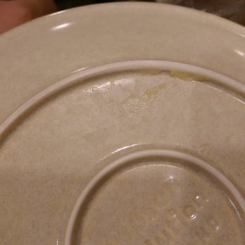 Monkeypod Kitchen - This unused plate wasn't clean. I picked it up and move it. There was gunk on the bottom. - Hawaiian Near Me - Kapolei, Hawaii