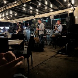 a band playing on stage a band playing on stage