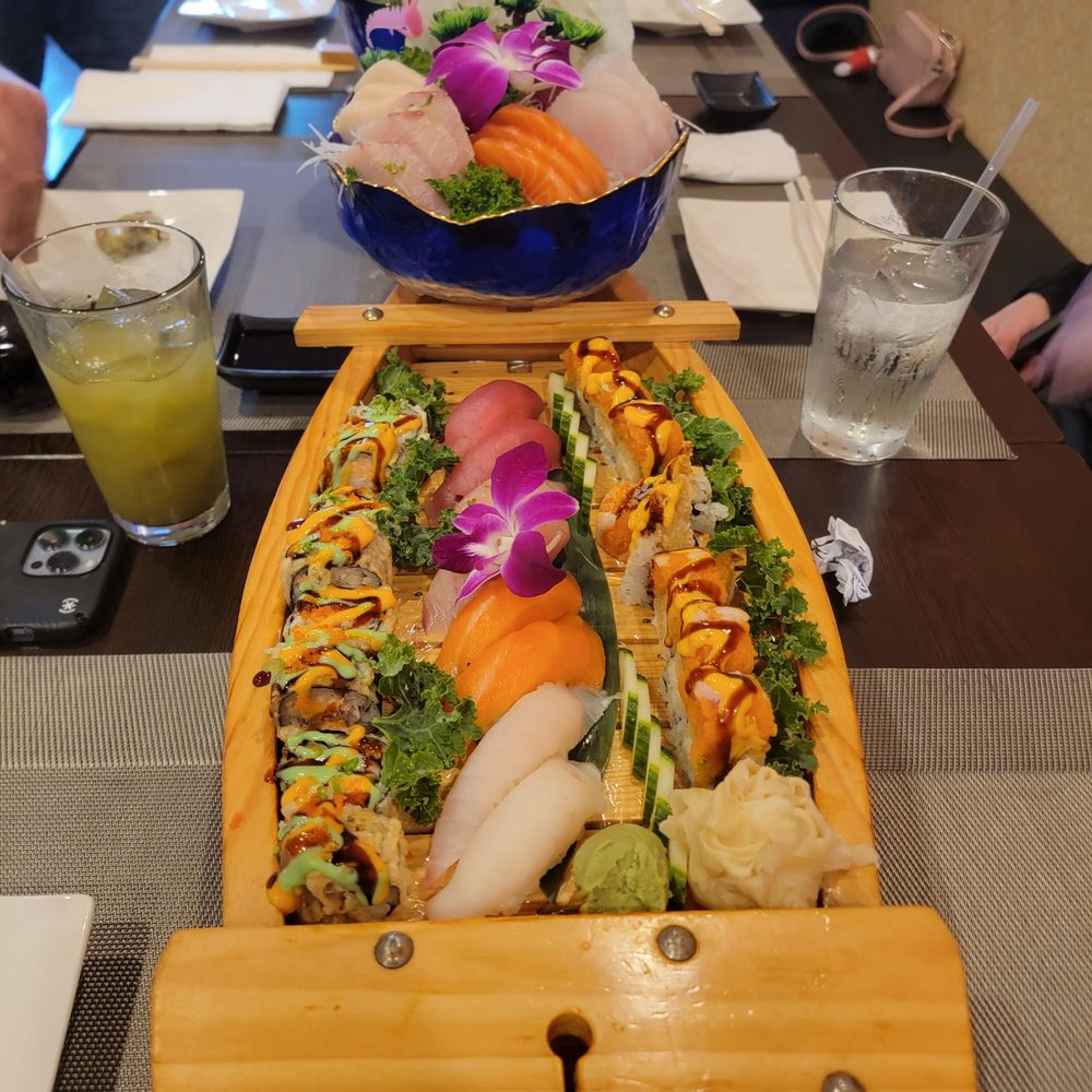 Taiko Japanese Restaurant - Sushi and Sashimi Love Boat for 2 with the Taiko Roll and Godzilla Roll - Sushi Bars Near Me - Springfield, Virginia Taiko Japanese Restaurant - Sushi and Sashimi Love Boat for 2 with the Taiko Roll and Godzilla Roll - Sushi Bars Near Me - Springfield, Virginia