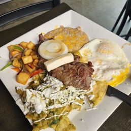 Chilaquiles Verdes with steak Chilaquiles Verdes with steak