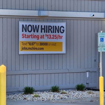 McDonald's - a now hiring sign on the side of a building - Burgers Near Me - Freeport, Illinois