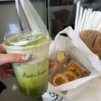Tous Les Jours - tiramisu matcha latte, honey cream cheese mochi pancakes, a few other baked goods in the bag - Bakeries Near Me - Cerritos, California Tous Les Jours - tiramisu matcha latte, honey cream cheese mochi pancakes, a few other baked goods in the bag - Bakeries Near Me - Cerritos, California