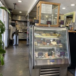 a display case of pastries and pastries