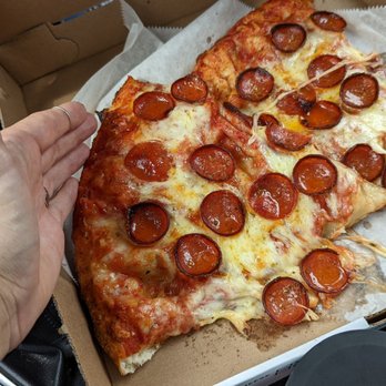 Bozzy's Pizzeria - Come on, this slice is gigantic - Pizza Near Me - Lancaster, New York Bozzy's Pizzeria - Come on, this slice is gigantic - Pizza Near Me - Lancaster, New York
