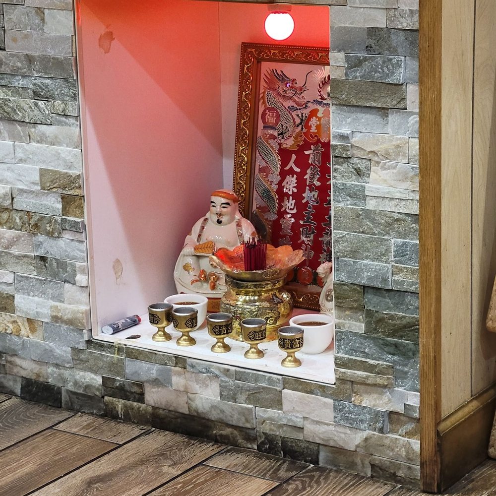 Pho Viet - a small shrine in a stone wall - Vietnamese Near Me - Hagerstown, Maryland