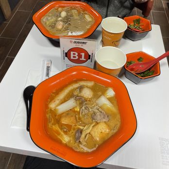 Zhangliang Malatang - a bowl of soup with meat and vegetables - Hot Pot Near Me - Chicago, Illinois Zhangliang Malatang - a bowl of soup with meat and vegetables - Hot Pot Near Me - Chicago, Illinois