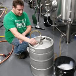 Grumpy brewmaster Brett D. is kegging up some frosty goodness. Grumpy brewmaster Brett D. is kegging up some frosty goodness.