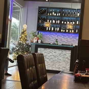 Golden China - a bar with a christmas tree in the background - Chinese Near Me - Houston, Texas