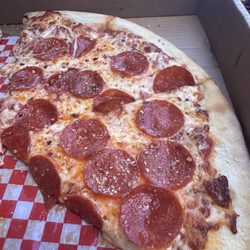 Old School Pizzeria - The pepperoni pizza is cooked to perfection. Their dough is incredible.