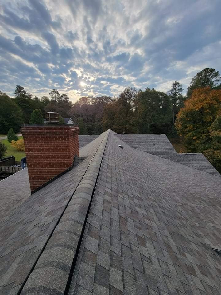 Slide of Chris Moore Roofing