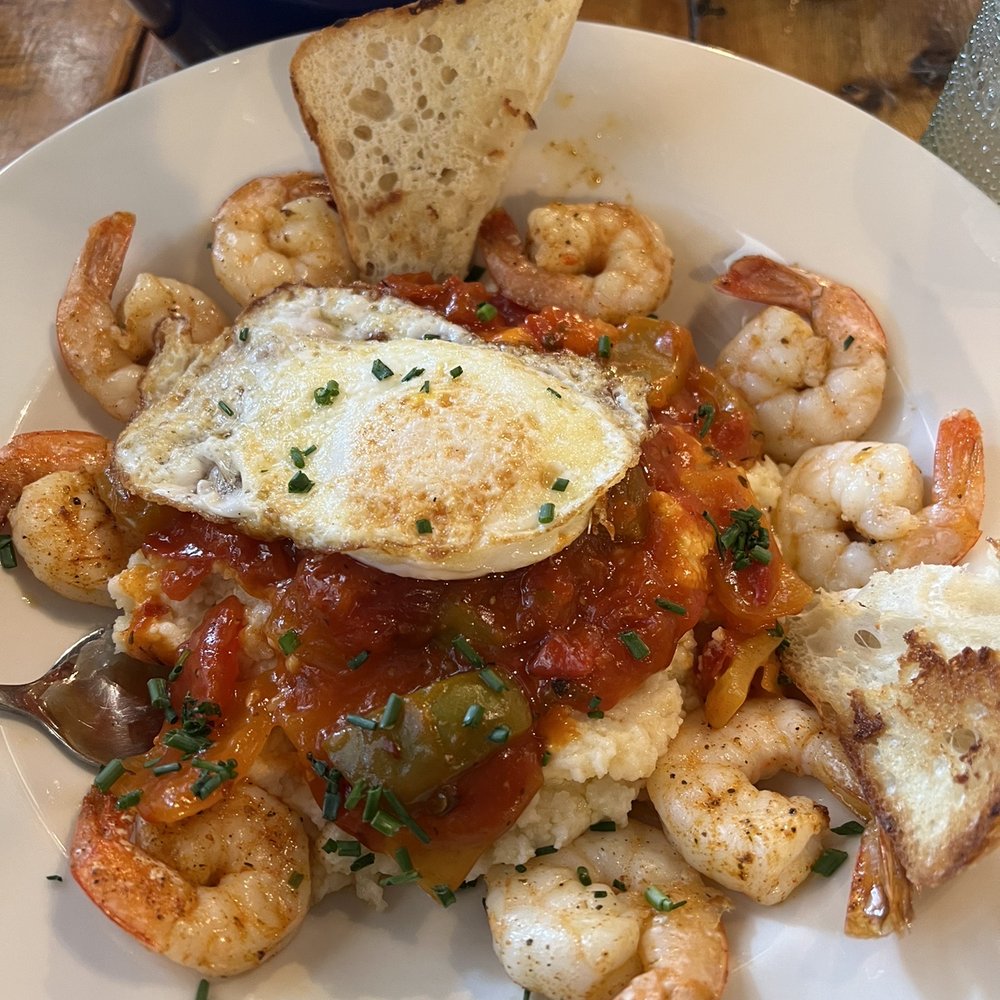Milton's - Double Shrimp and grits with an over medium egg - New American Near Me - Crystal, Minnesota