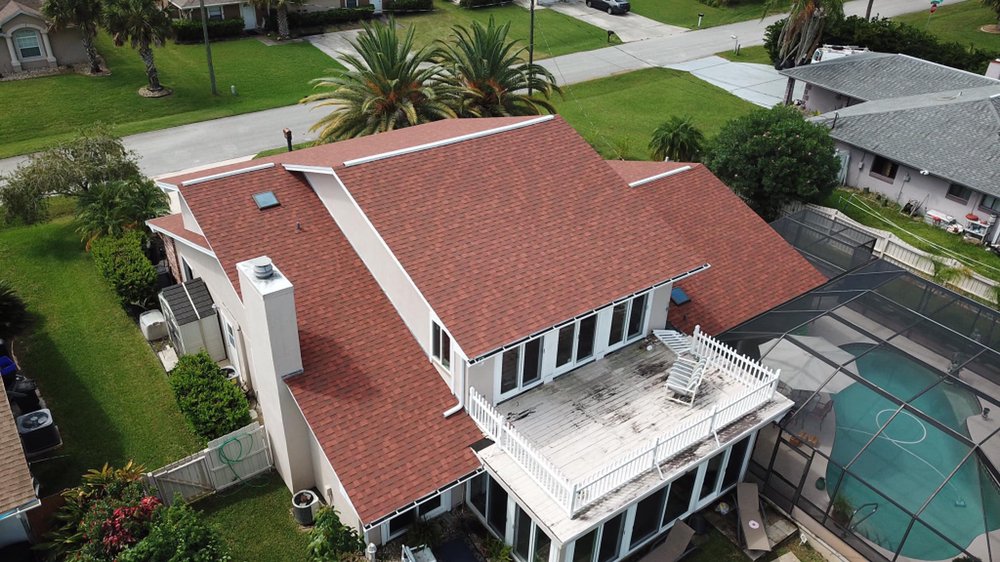 Slide of EZ Roofing of Flagler County