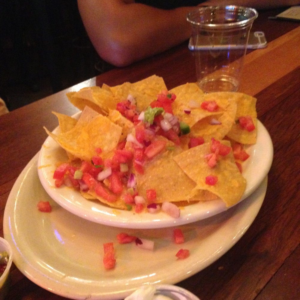 Pono Ranch - No black beans, barely any cheese. Just some pico on some chips. Also notice the empty drink, since we'd been waiting awhile. - American Near Me - Seattle, Washington Pono Ranch - No black beans, barely any cheese. Just some pico on some chips. Also notice the empty drink, since we'd been waiting awhile. - American Near Me - Seattle, Washington
