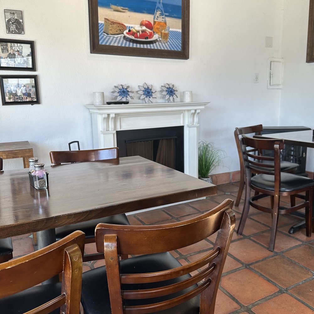Uncle Stavros Cafe - a dining room with tables and chairs - Cafes Near Me - Hermosa Beach, California Uncle Stavros Cafe - a dining room with tables and chairs - Cafes Near Me - Hermosa Beach, California
