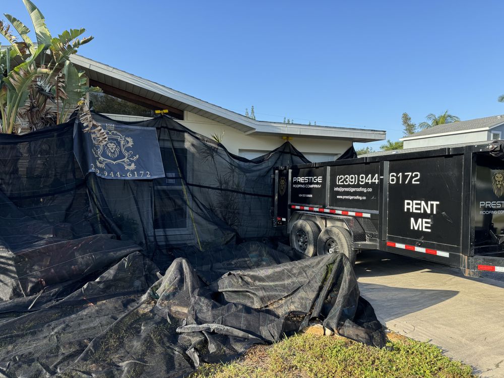 Slide of Prestige Roofing Company