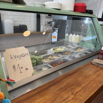Loli Farms - Counter of side items - Peruvian Near Me - Pasadena, California