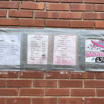 Coney Island - a menu on a brick wall - Fast Food Near Me - Crestview, Florida