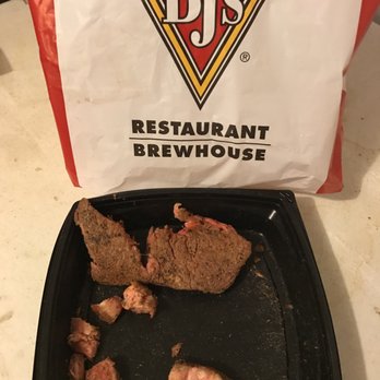 BJ's Restaurant & Brewhouse - Side 2 flipped over to put in take out container... there you are it's done. - Pizza Near Me - Slidell, Louisiana