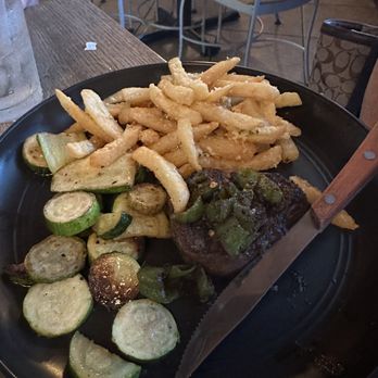 The Salted Goat - 4 ounce filet with Parmesan herb fries and zucchini - Gastropubs Near Me - DeBary, Florida