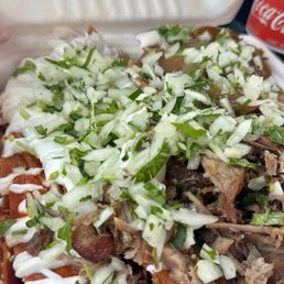 Red and green salsa chilaquiles