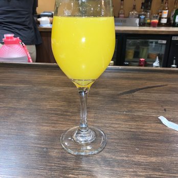 Famous Toastery - Mimosa at the bar downstairs - Breakfast & Brunch Near Me - Charlotte, North Carolina Famous Toastery - Mimosa at the bar downstairs - Breakfast & Brunch Near Me - Charlotte, North Carolina