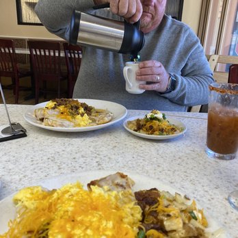 Cornerstone Bakery & Cafe - Pouring some delicious pinon coffee - Bakeries Near Me - Ruidoso, New Mexico