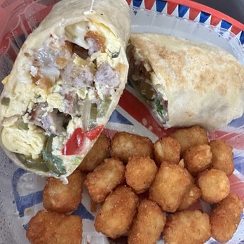 Graze - Epic breakfast burrito with no beans + pork sausage and side of tots - Waffles Near Me - Tampa, Florida
