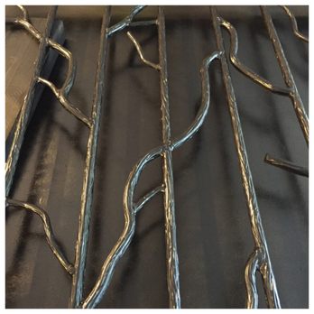 Decker Fission Welding - Wood bark steel design - Metal Fabricators Near Me