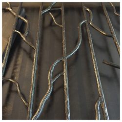 Decker Fission Welding - Wood bark steel design