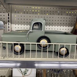 Dollar General - Tiny home furniture models and fake flowers