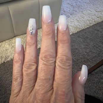 Fancy Nails - Pink-white tip ombre, coffin shape, medium length, with some bling on the ring finger. LVE my nails. They always do a great job. - Nail Salons Near Me - Navarre, Florida Fancy Nails - Pink-white tip ombre, coffin shape, medium length, with some bling on the ring finger. LVE my nails. They always do a great job. - Nail Salons Near Me - Navarre, Florida