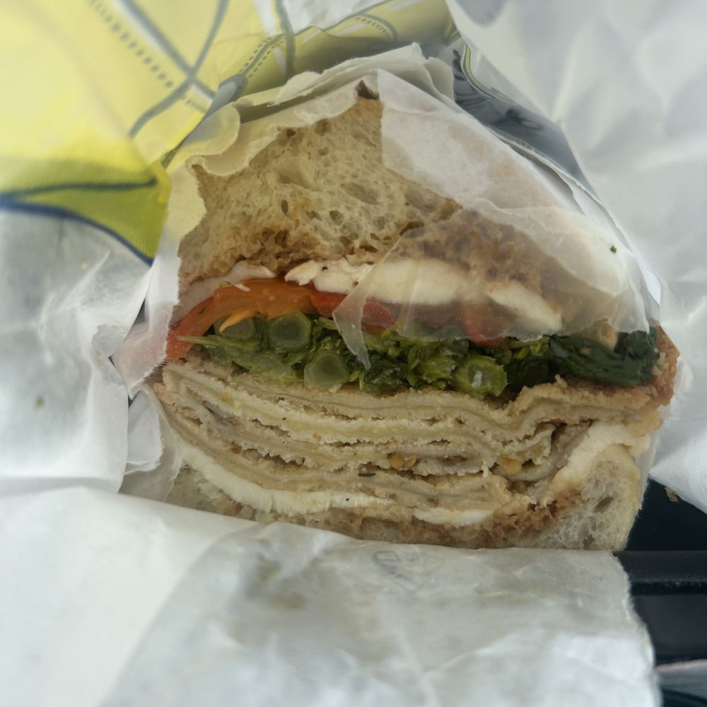 Sandwich with eggplant and broccolli rabe. Eggplant delicious, rabbe not quite. Also, capresse option was soo garlicky it made me nauseous. Sandwich with eggplant and broccolli rabe. Eggplant delicious, rabbe not quite. Also, capresse option was soo garlicky it made me nauseous.