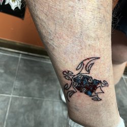 Circle Of Fire Tattoo - Turtle with Autistic puzzle piece.