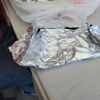 Burritos La Palma - a burrito wrapped in aluminum foil - Mexican Near Me - Los Angeles, California Burritos La Palma - a burrito wrapped in aluminum foil - Mexican Near Me - Los Angeles, California