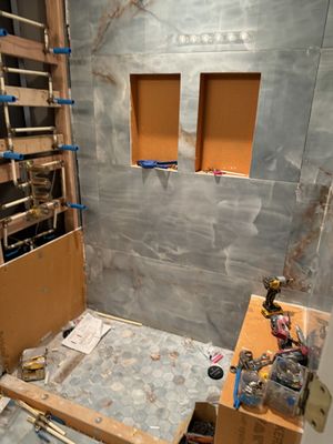 Em Home Remodeling Logo