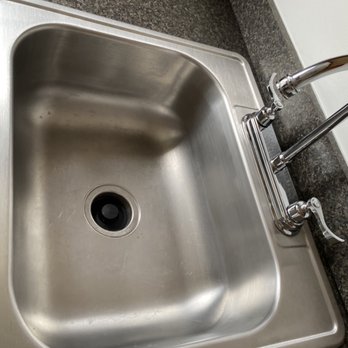 A100 Cleaning Service - Kitchen sink , cleaned and polished - Office Cleaning Near Me