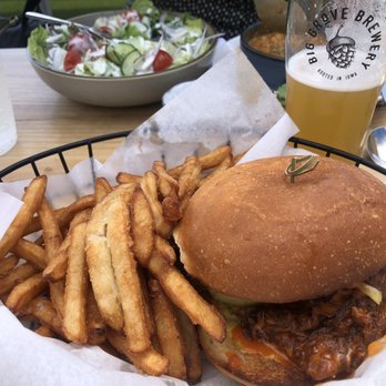 Big Grove Brewery - Chicken Sandwich & Fries, Side salad and Corn Chowder in background. - Brewpubs Near Me - Des Moines, Iowa Big Grove Brewery - Chicken Sandwich & Fries, Side salad and Corn Chowder in background. - Brewpubs Near Me - Des Moines, Iowa