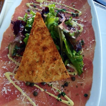 Brio Italian Grille - Beef Carpaccio goodness. A must!!!! Just 4 bucks at HH - Italian Near Me - Gilbert, Arizona