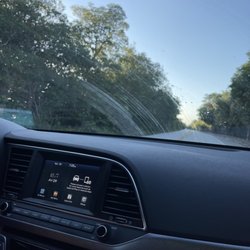 Dollar Car Rental - As good as it get with the wipers big smug right in yourface