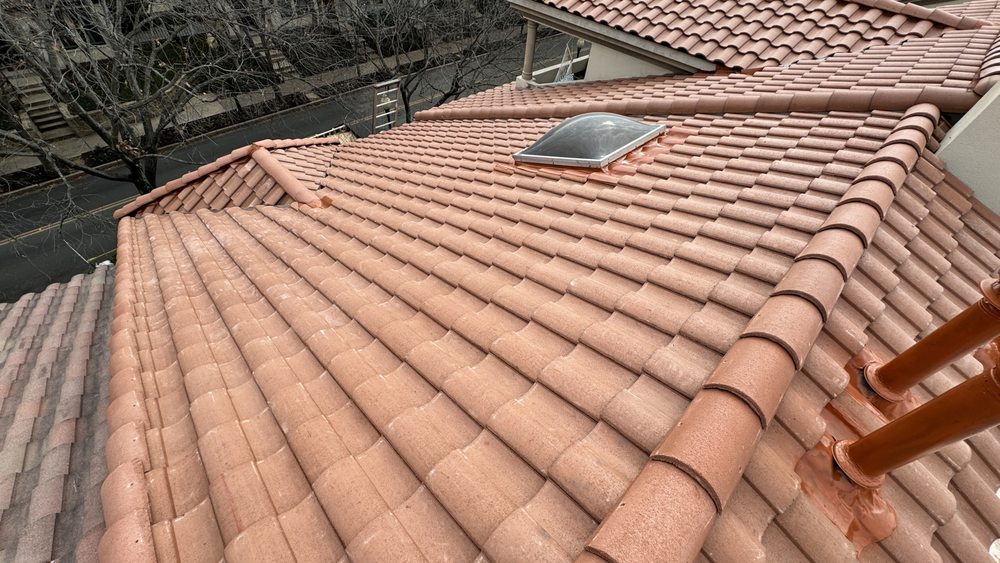 Slide of New Elite Roofing