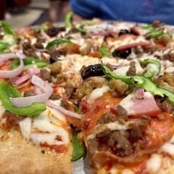 Forgotten Coast Brewing Company - Beach supreme pizza with gluten free crust