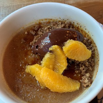 The Dearborn - PECAN-PRALINE CREME BRULEE  dark chocolate ganache, candied pecans, orange - New American Near Me - Chicago, Illinois