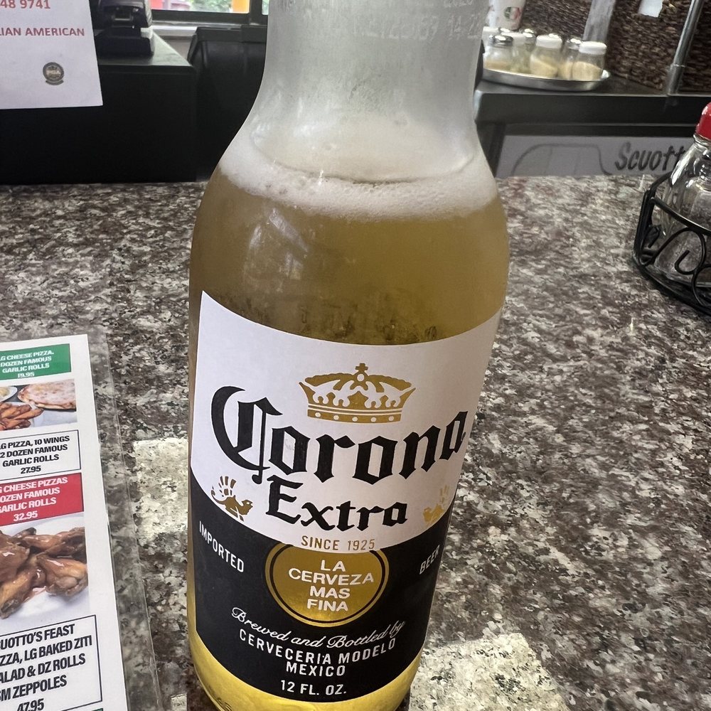 Scuotto's Pizza Cafe - Corona - Pizza Near Me - Sunrise, Florida Scuotto's Pizza Cafe - Corona - Pizza Near Me - Sunrise, Florida