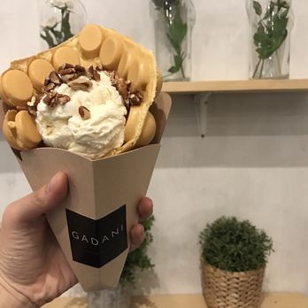 Gadani - Geranium with pecans tucked into a original flavored egg puff waffle - Coffee & Tea Near Me - Berkeley, California Gadani - Geranium with pecans tucked into a original flavored egg puff waffle - Coffee & Tea Near Me - Berkeley, California