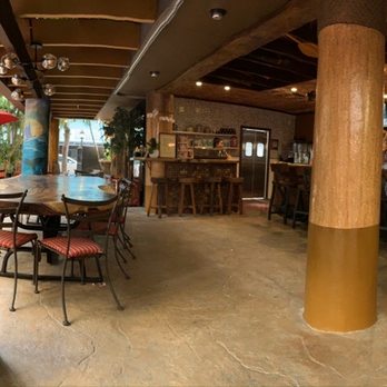 Ko Tiki Terrace - 360 view of the tiki bar and seats surrounding it - Tiki Bars Near Me - Honolulu, Hawaii