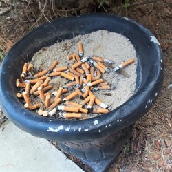 Church Street Apartments - The quality of the tenant's cleaning her smoking container outside of where three other tenants live, no one else smoking like a chimney!