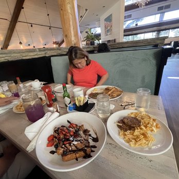 Toast Kitchen & Bar - House French Toast with a side of chips and sausage patty, Surf and Turf Benedict, Steak Breakfast - Breakfast & Brunch Near Me - Brea, California